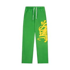 Syna World Statement Street Culture Graphic Sweatpants (Green / Yellow)